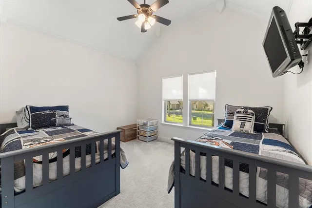 a bedroom with furniture and a window
