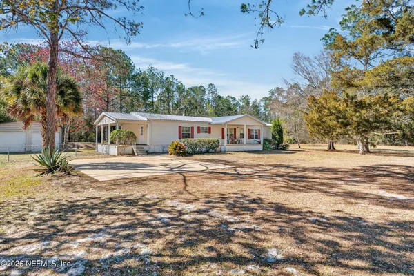 a house view with a outdoor space
