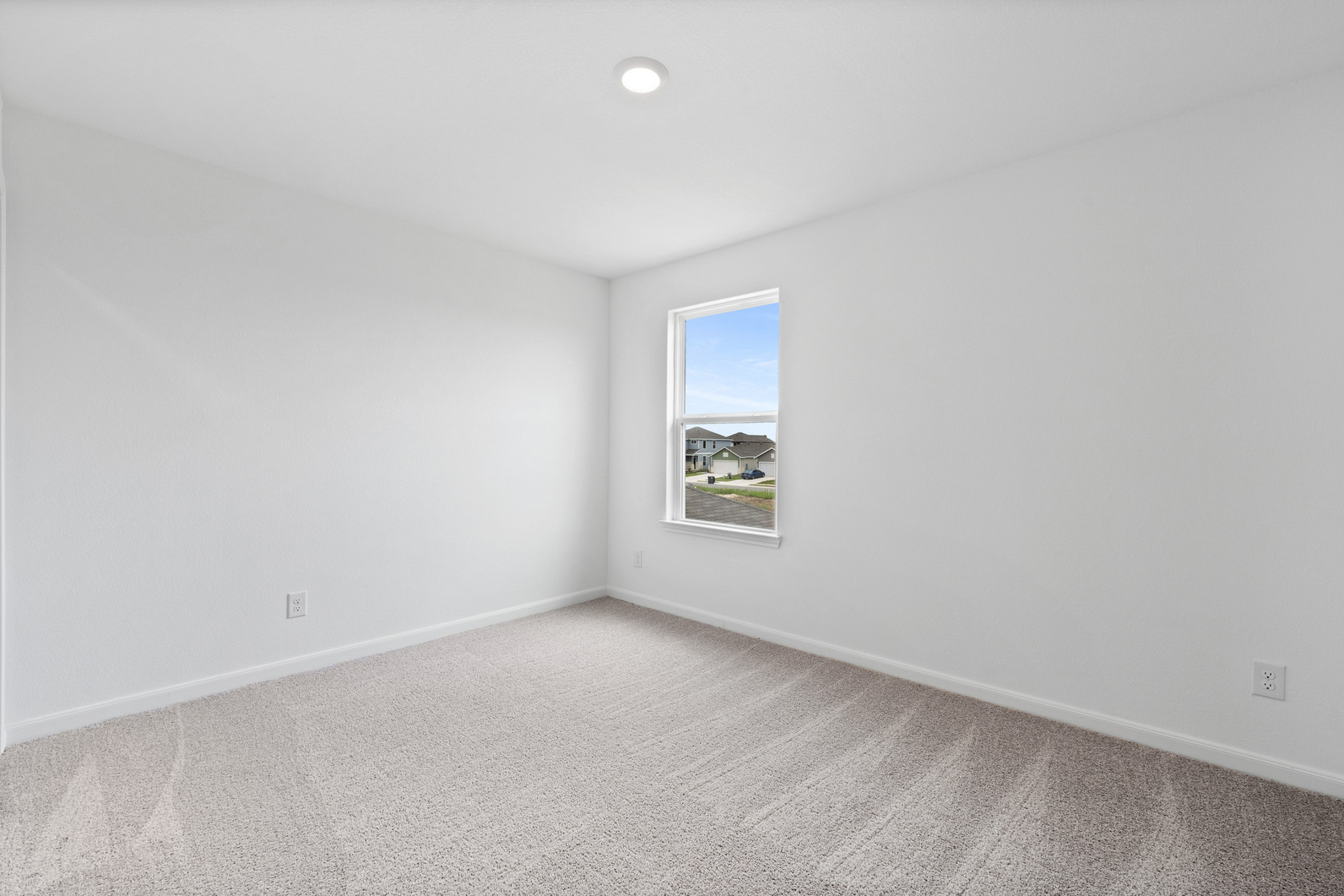 409 Silent Meadow Run Maxwell, TX 78656 - Photo 8 of 10 Spare room with baseboards and carpet flooring