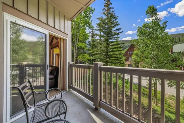 a balcony with chairs