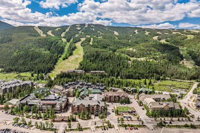 a view of a street with cars