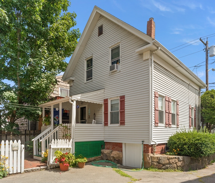 a front view of a house with a porch