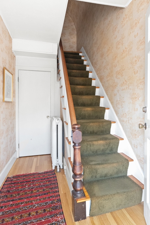 56 Washington Street Gloucester, MA 01930 - Photo 21 of 29 a view of entryway and hall with wooden floor