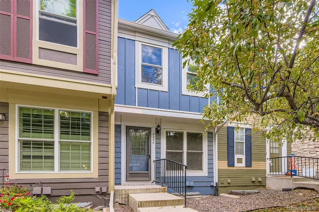 a view of a brick house with a large windows