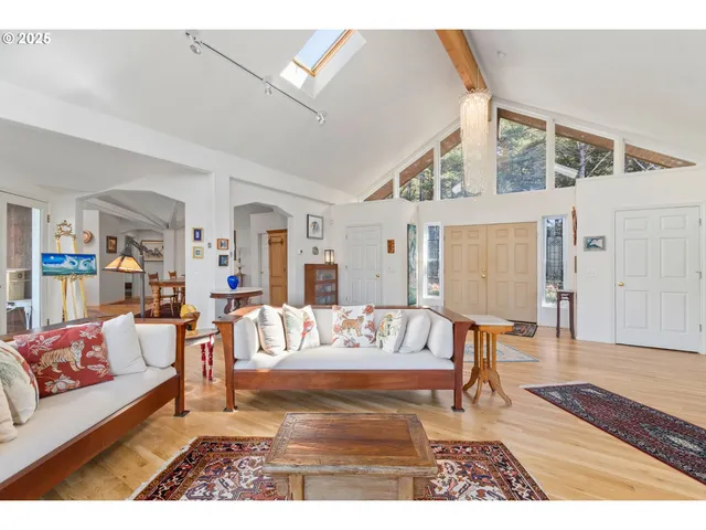 a living room with furniture and a rug
