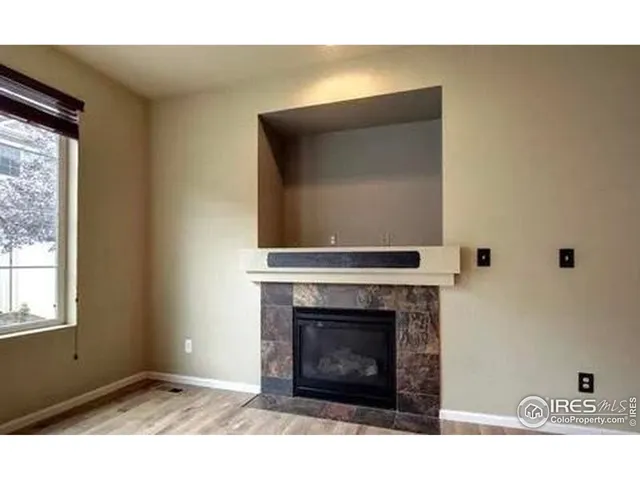 a living room with a fireplace