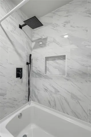 a bathroom with a bathtub