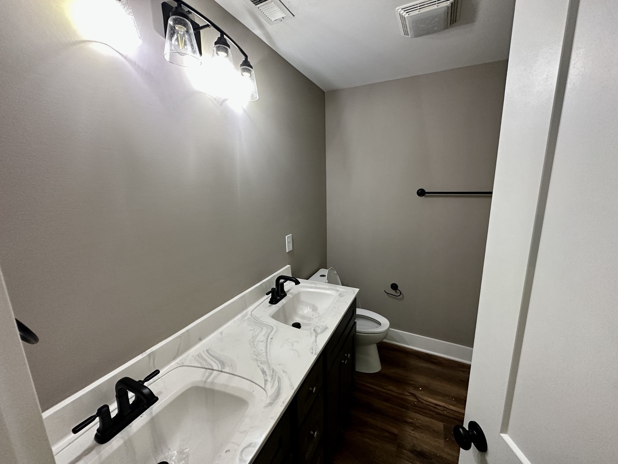 412 South Aztec Drive White House, TN 37188 - Photo 11 of 15 a bathroom with a sink and a mirror