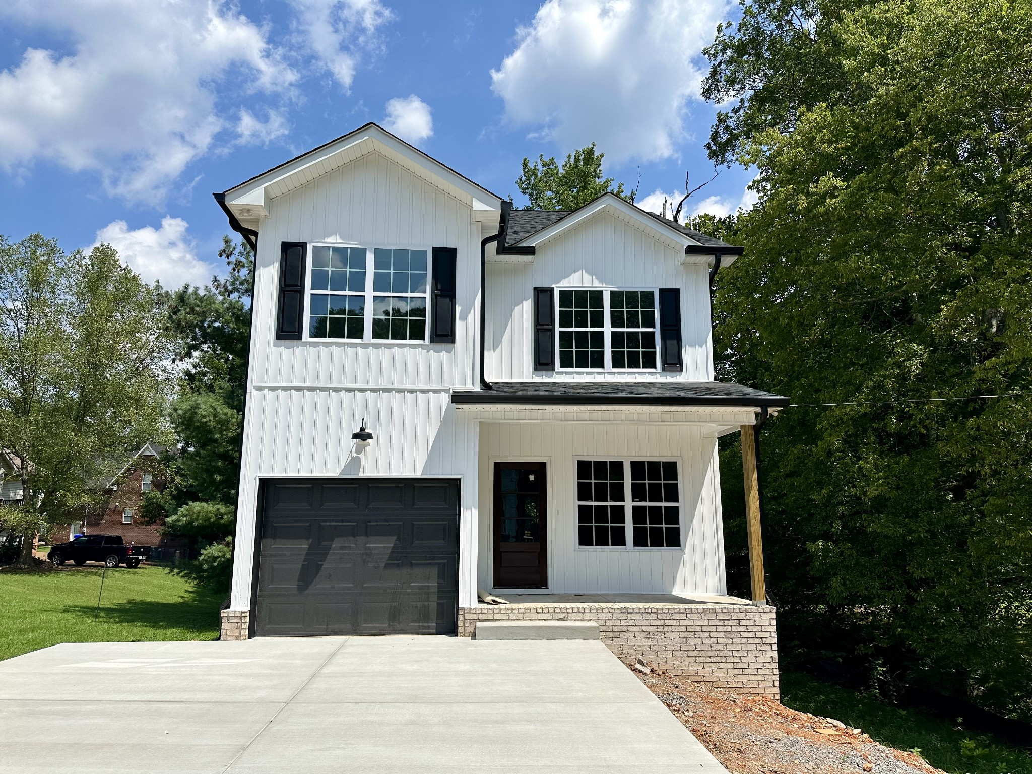 412 South Aztec Drive White House, TN 37188 - Photo 15 of 15 a front view of a house with a garden