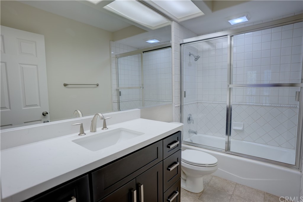 2 Chandon Newport Coast, CA 92657 - Photo 13 of 22 a bathroom with a sink toilet and shower