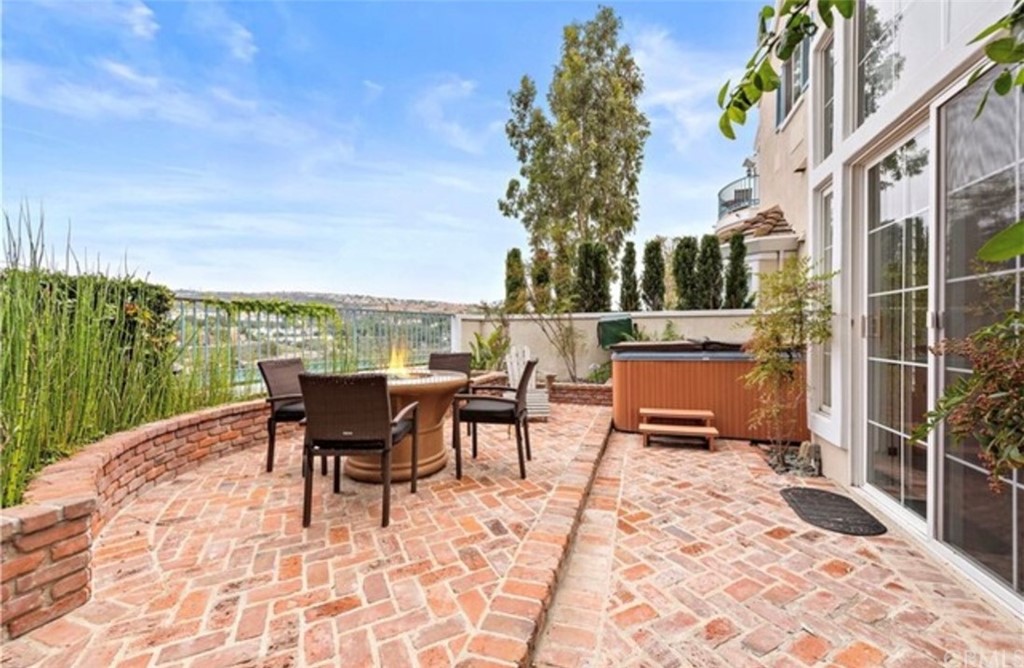 2 Chandon Newport Coast, CA 92657 - Photo 14 of 22 a view of a roof deck with table and chairs