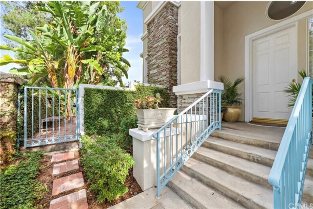 2 Chandon Newport Coast, CA 92657 - Photo 3 of 22 a view of a house with a small yard