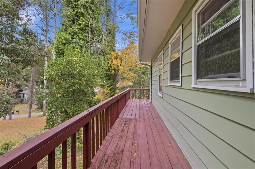 14 Mitchell Circle Southeast Rome, GA 30161 - Photo 7 of 39 a view of a balcony with wooden floor and fence