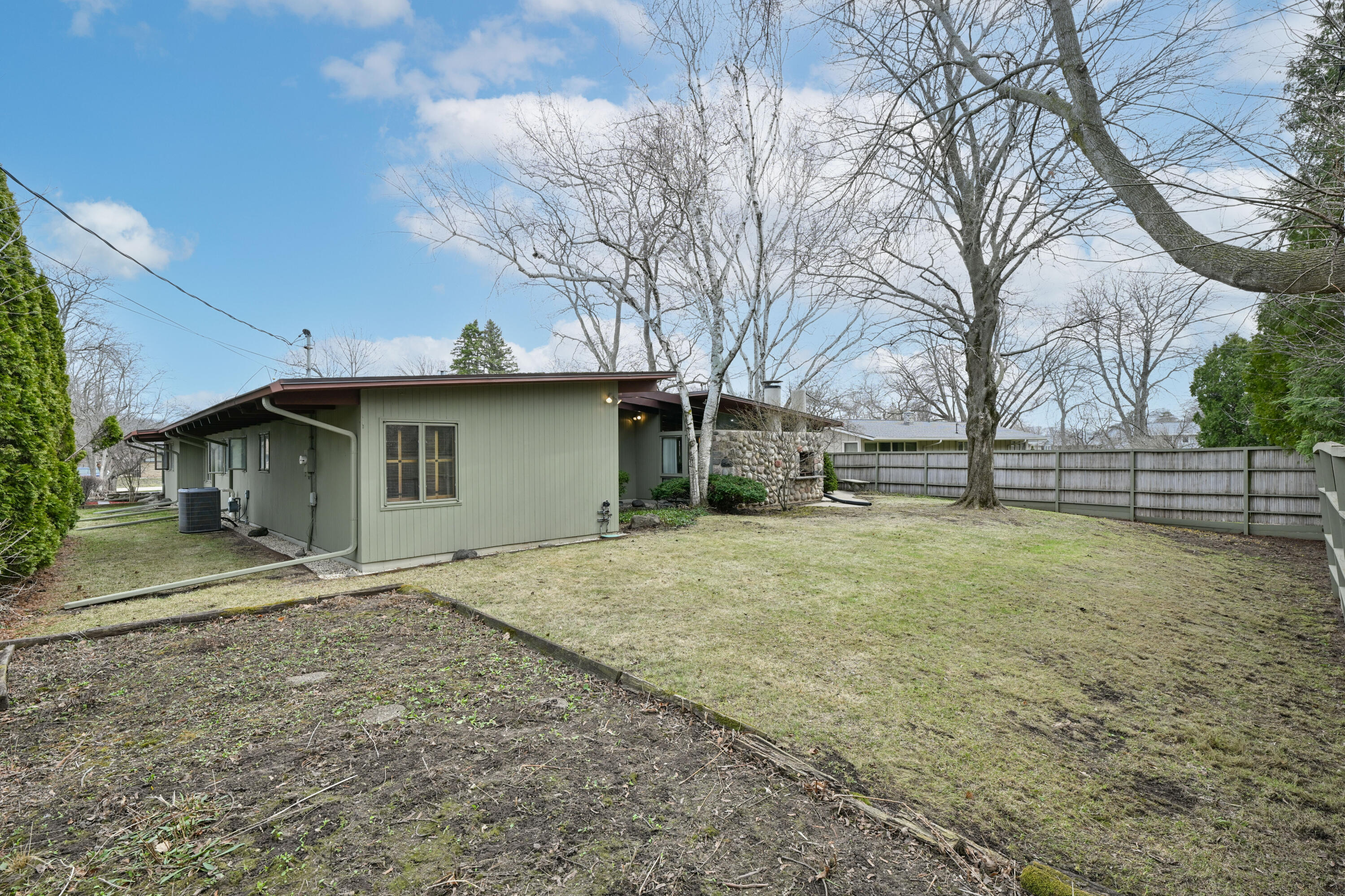 8925 North Maitland Road Bayside, WI 53217 - Photo 36 of 40 Fenced-in Yard Perfert for Playtime