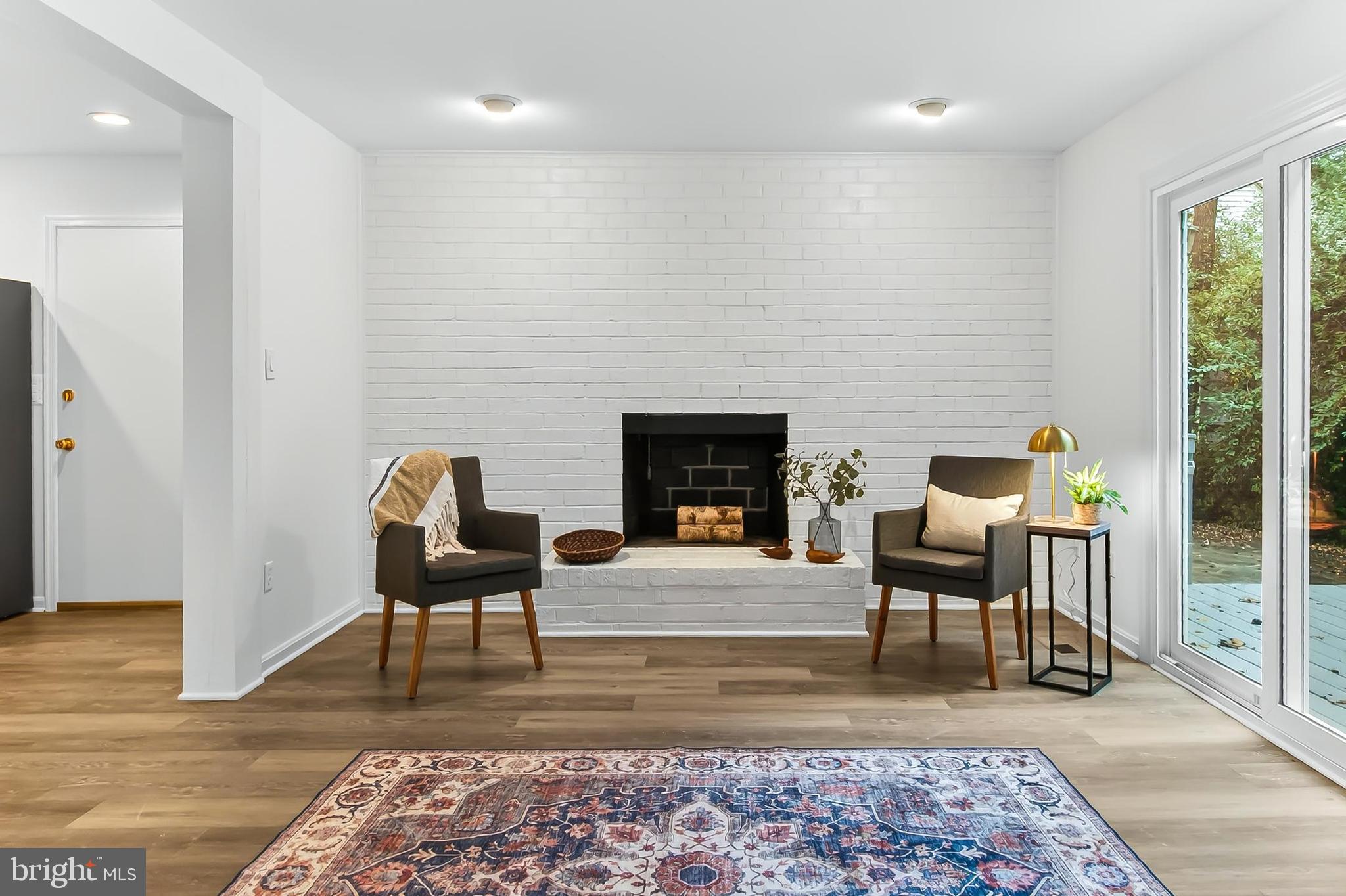 2015 Soapstone Drive Reston, VA 20191 - Photo 3 of 53 Welcoming Family Room with wood-burning fireplace