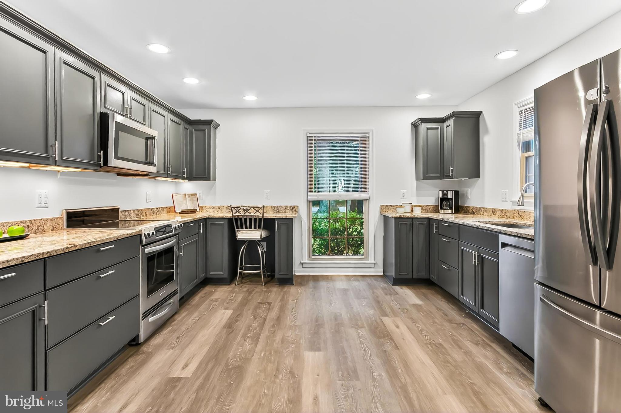2015 Soapstone Drive Reston, VA 20191 - Photo 8 of 53 Loads of counterspace and lots of storage