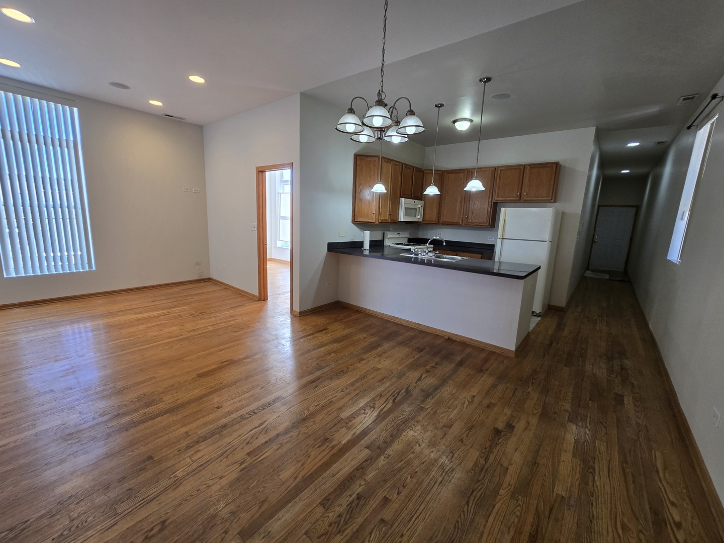 1700 West Cermak Road, Unit 2R Chicago, IL 60608 - Photo 9 of 10 a view of a kitchen and dining room