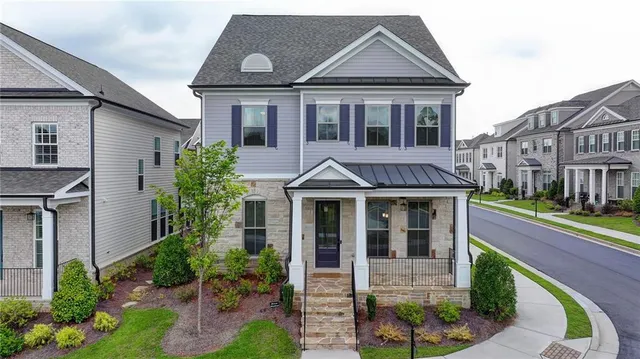 front view of a house with a yard