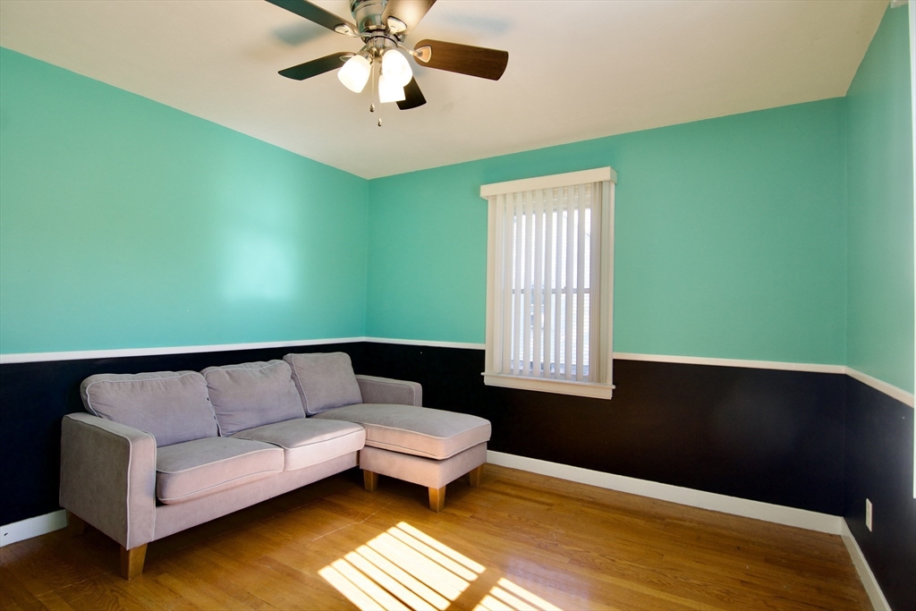 586 Granby Road South Hadley, MA 01075 - Photo 16 of 36 a living room with furniture and a rug