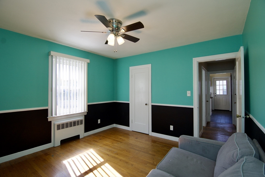 586 Granby Road South Hadley, MA 01075 - Photo 17 of 36 a living room with furniture and a flat screen tv