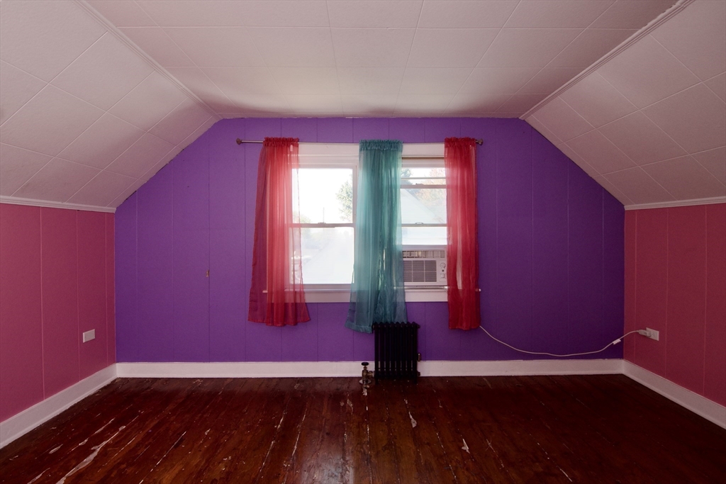 586 Granby Road South Hadley, MA 01075 - Photo 24 of 36 a view of empty room with wooden floor and fan