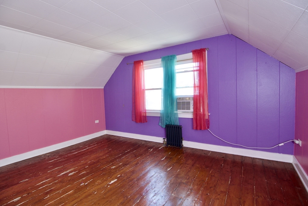 586 Granby Road South Hadley, MA 01075 - Photo 25 of 36 a view of empty room with wooden floor and fan