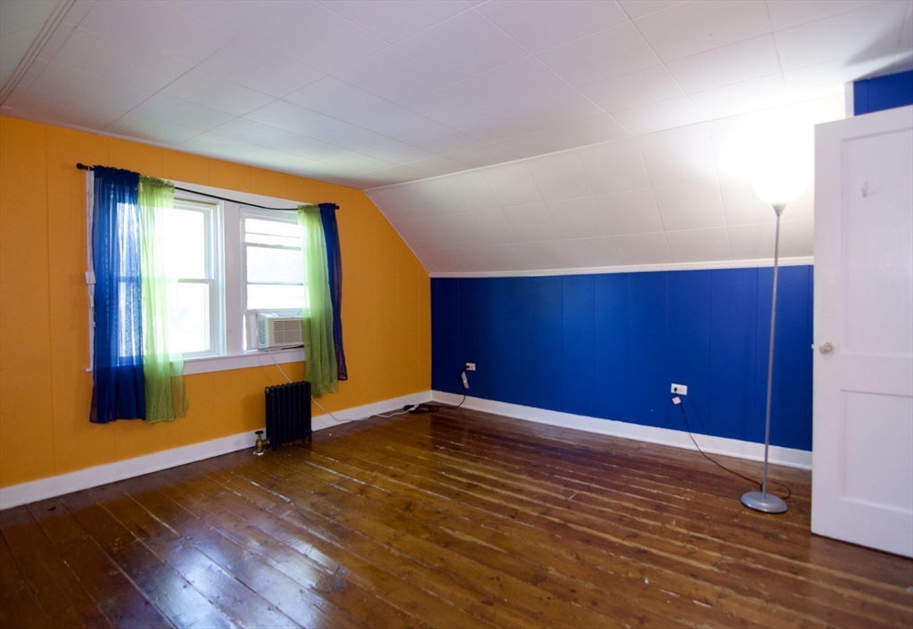586 Granby Road South Hadley, MA 01075 - Photo 29 of 36 a view of an empty room with wooden floor and a window