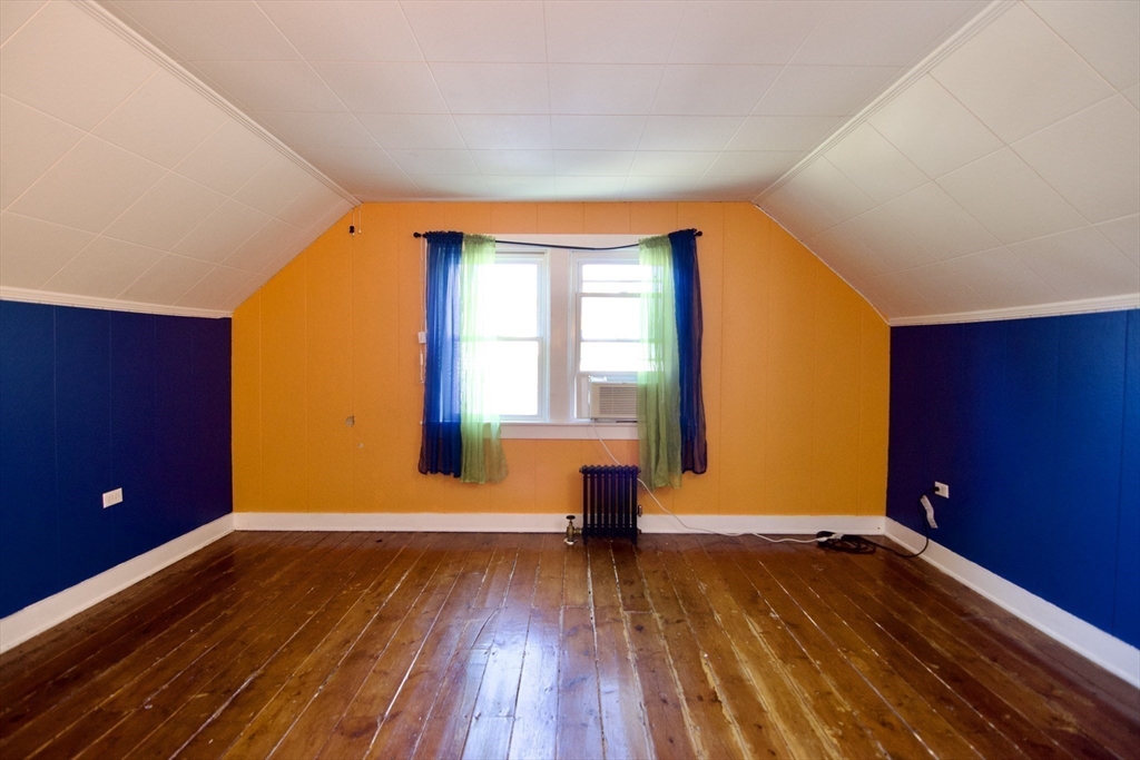 586 Granby Road South Hadley, MA 01075 - Photo 30 of 36 a view of empty room with wooden floor and fan