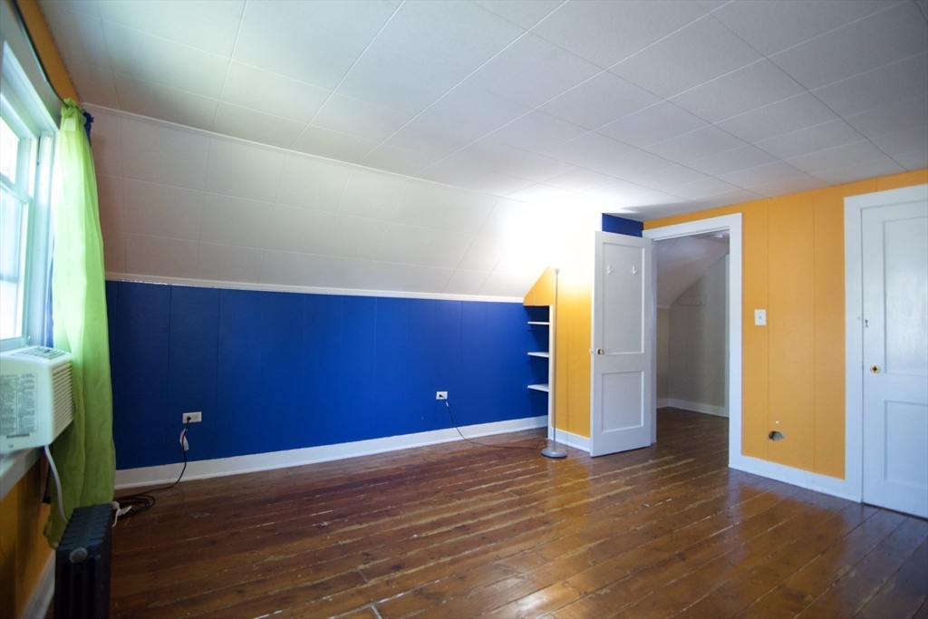 586 Granby Road South Hadley, MA 01075 - Photo 31 of 36 a view of empty room with wooden floor and fan