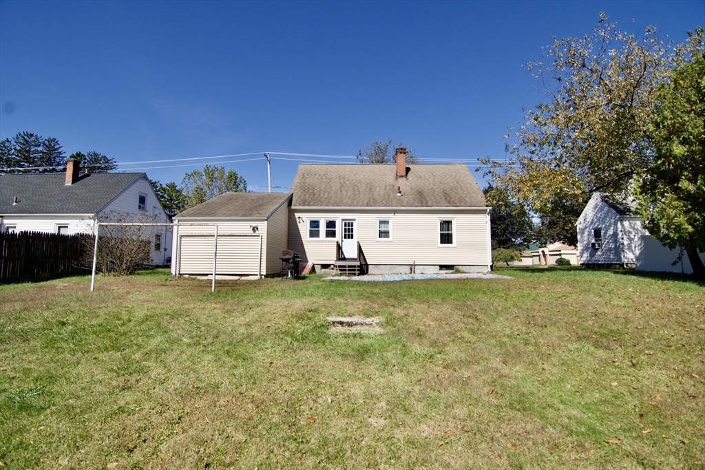 586 Granby Road South Hadley, MA 01075 - Photo 35 of 36 a front view of house with yard and trees