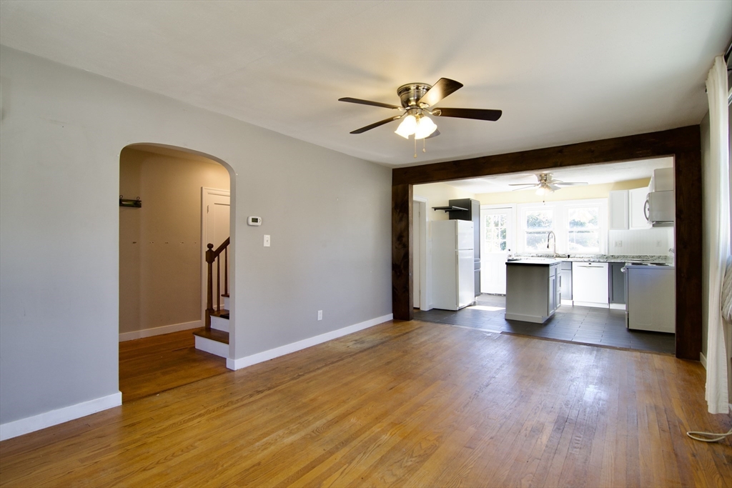 586 Granby Road South Hadley, MA 01075 - Photo 4 of 36 a view of an empty room with a window and wooden floor