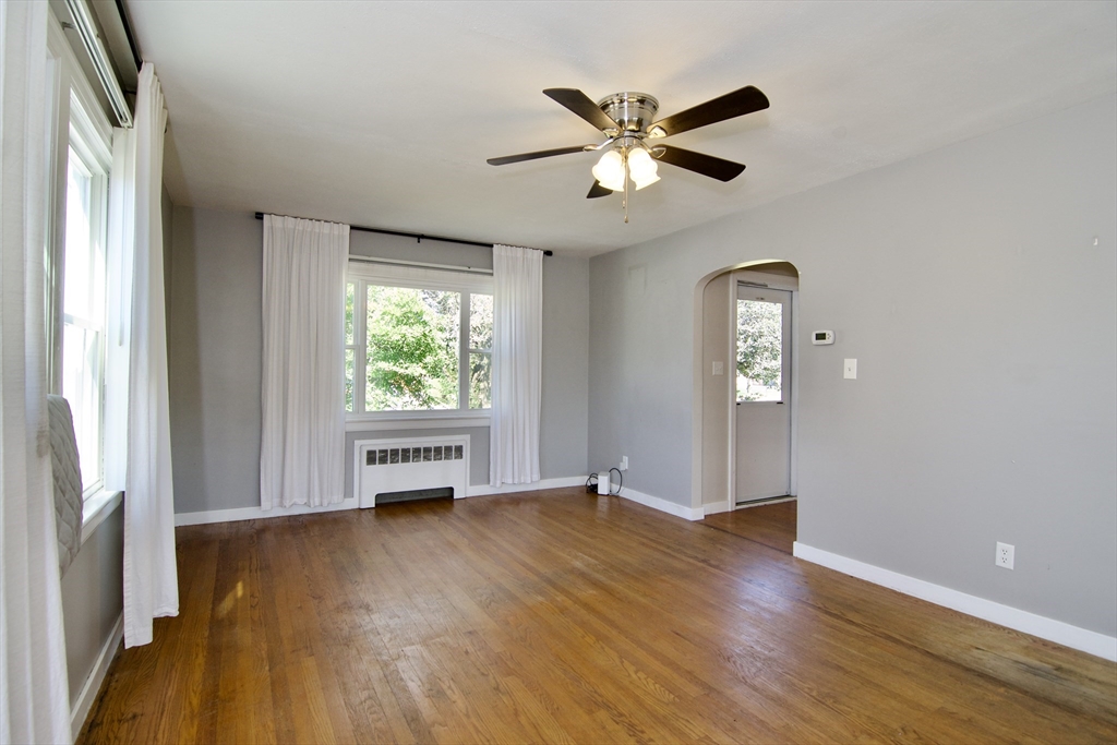 586 Granby Road South Hadley, MA 01075 - Photo 7 of 36 wooden floor in an empty room with a window