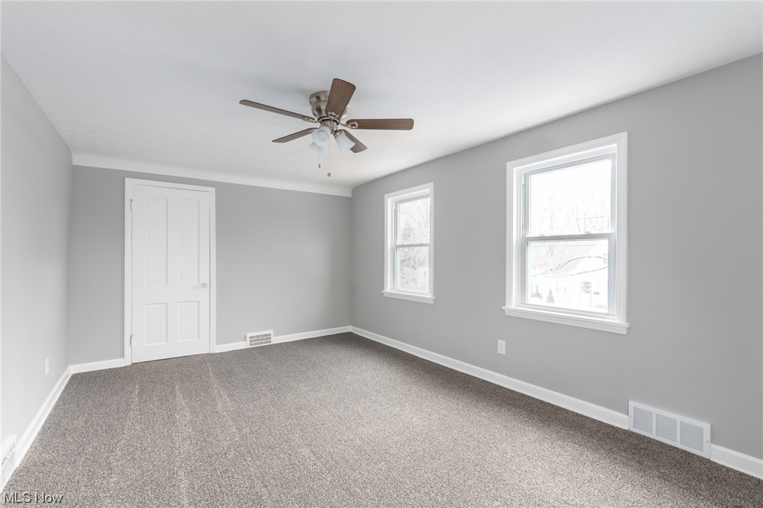 2410 Rinard Road Cleveland, OH 44118 - Photo 16 of 24 Carpeted empty room featuring ceiling fan