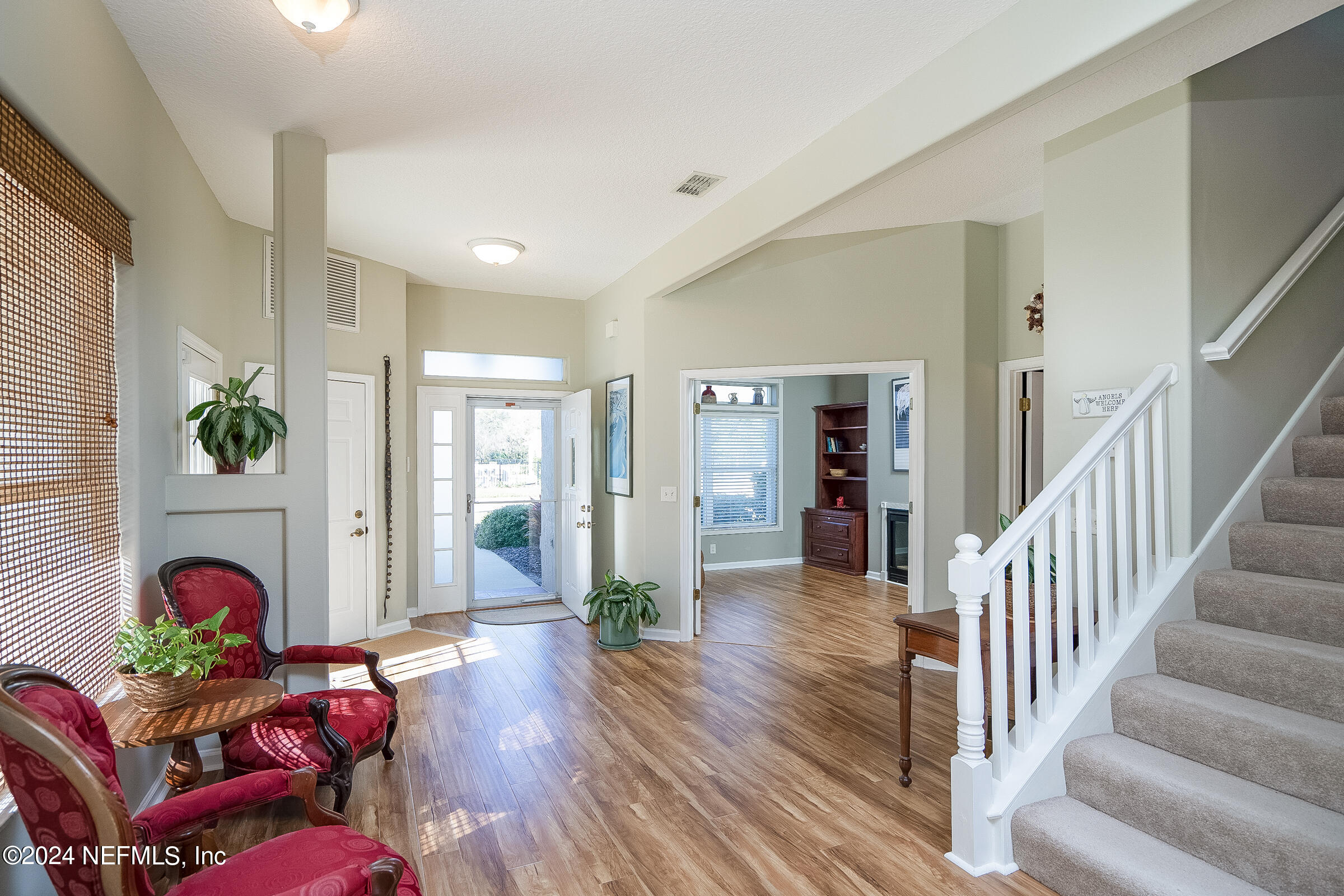 165 Cedar Ridge Circle St. Augustine, FL 32080 - Photo 11 of 45 a living room with furniture and wooden floor