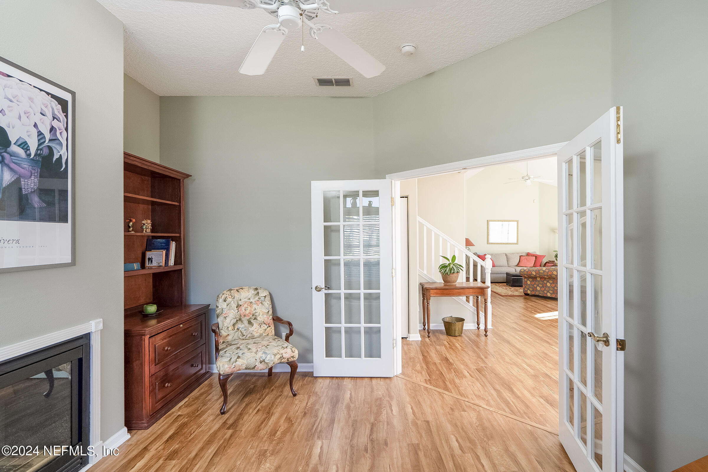 165 Cedar Ridge Circle St. Augustine, FL 32080 - Photo 15 of 45 a living room with furniture and a wooden floor