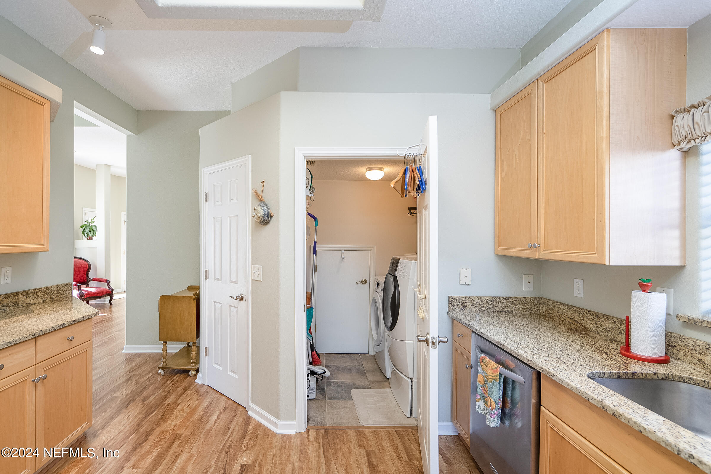 165 Cedar Ridge Circle St. Augustine, FL 32080 - Photo 19 of 45 a kitchen with a refrigerator and a sink