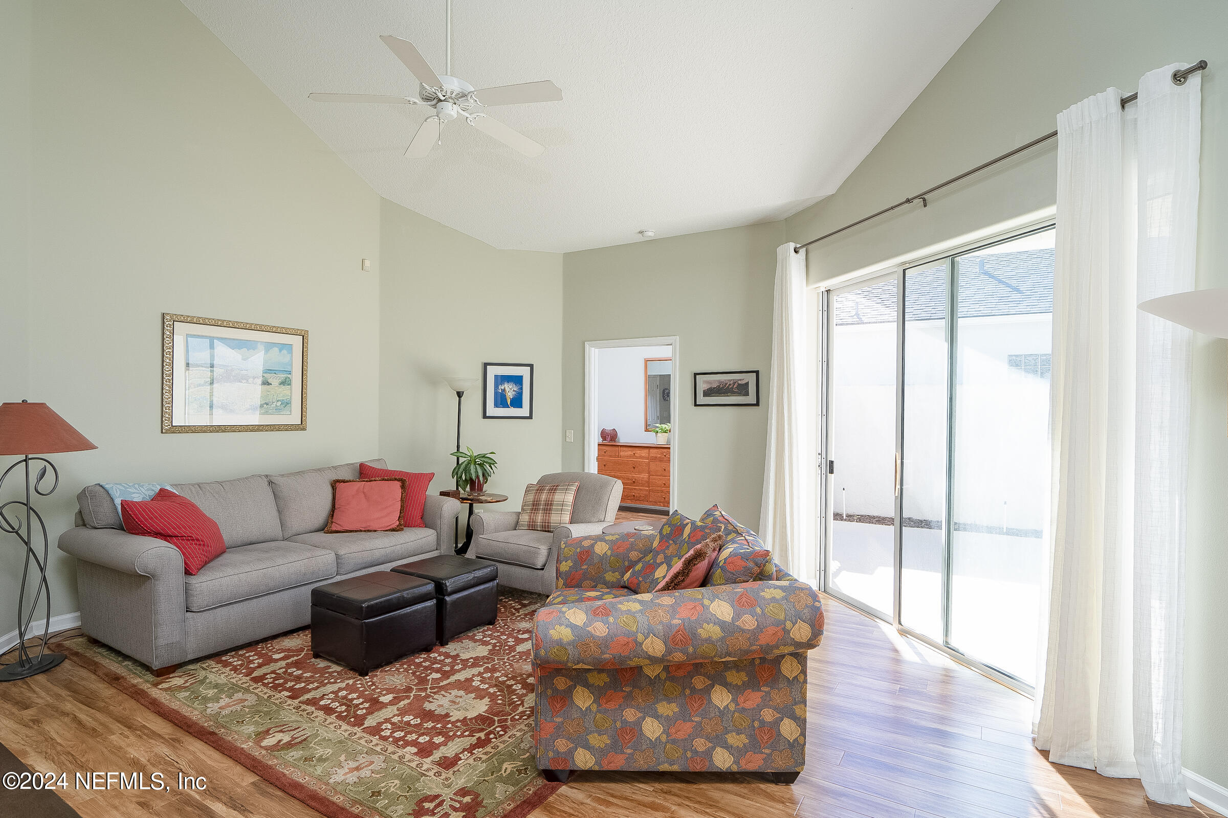 165 Cedar Ridge Circle St. Augustine, FL 32080 - Photo 20 of 45 a living room with furniture and a window