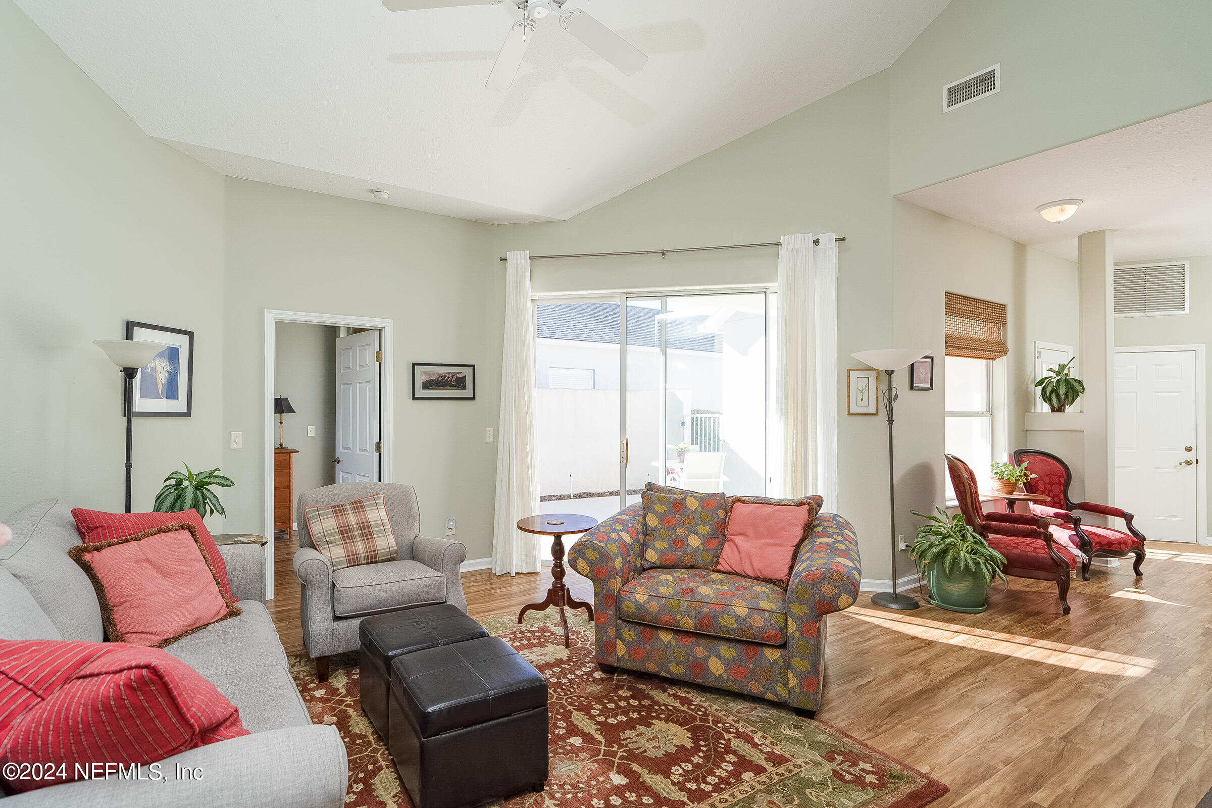 165 Cedar Ridge Circle St. Augustine, FL 32080 - Photo 22 of 45 a living room with furniture and wooden floor