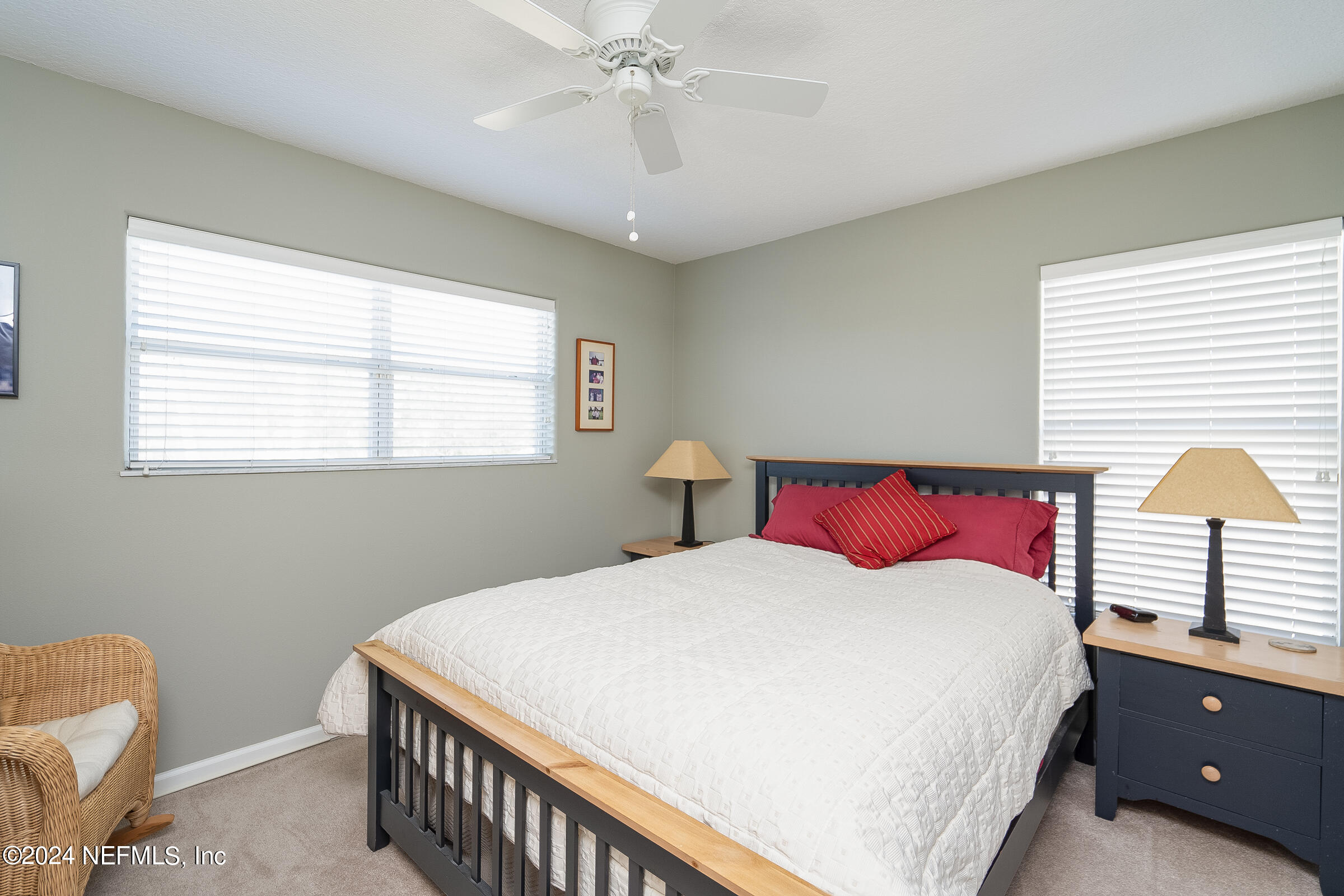 165 Cedar Ridge Circle St. Augustine, FL 32080 - Photo 24 of 45 a bedroom with a bed and window