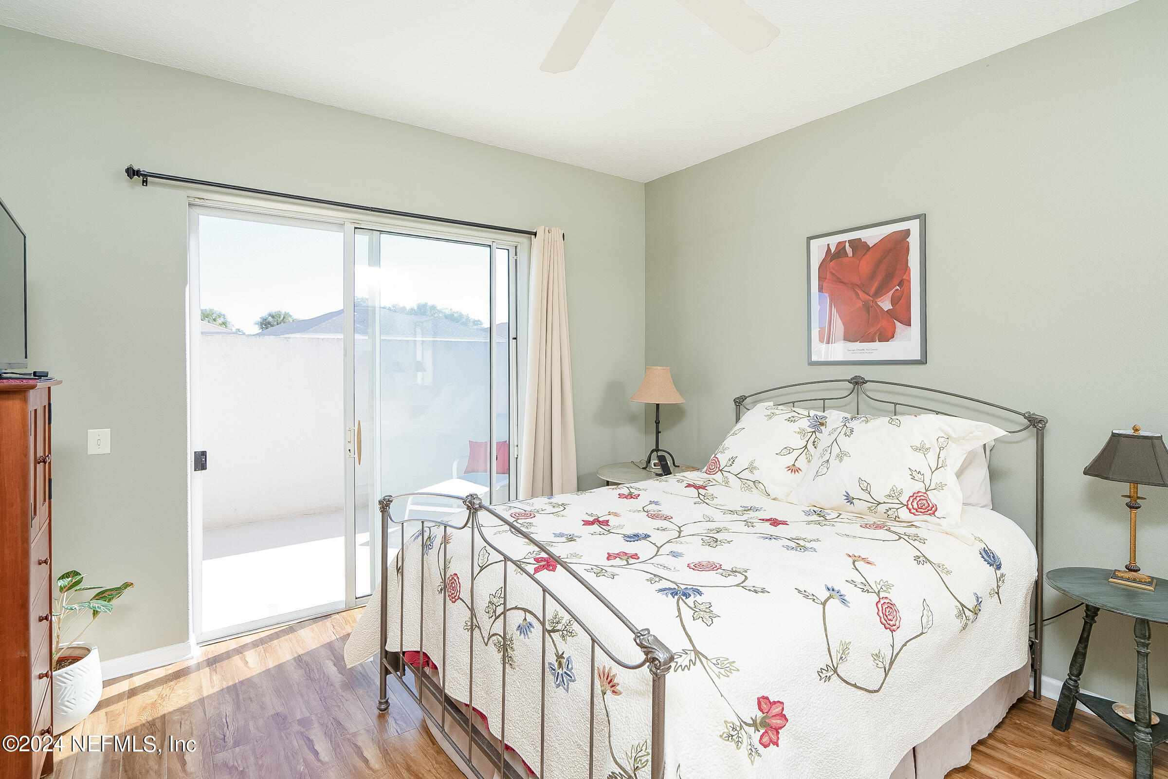 165 Cedar Ridge Circle St. Augustine, FL 32080 - Photo 25 of 45 a bedroom with a bed and a large window