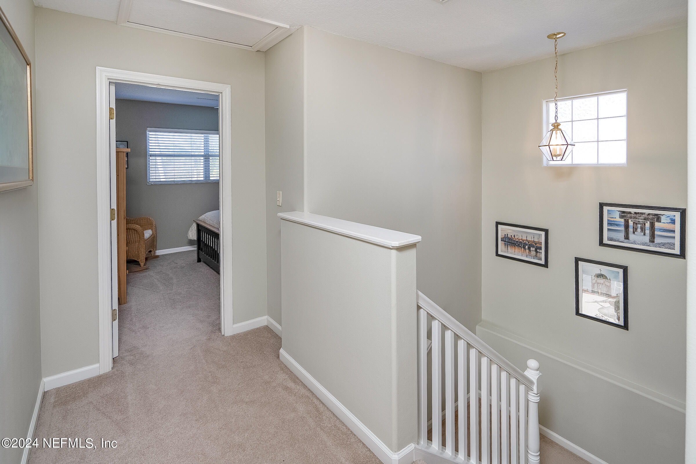 165 Cedar Ridge Circle St. Augustine, FL 32080 - Photo 30 of 45 a view of a hallway with a window and a livingroom