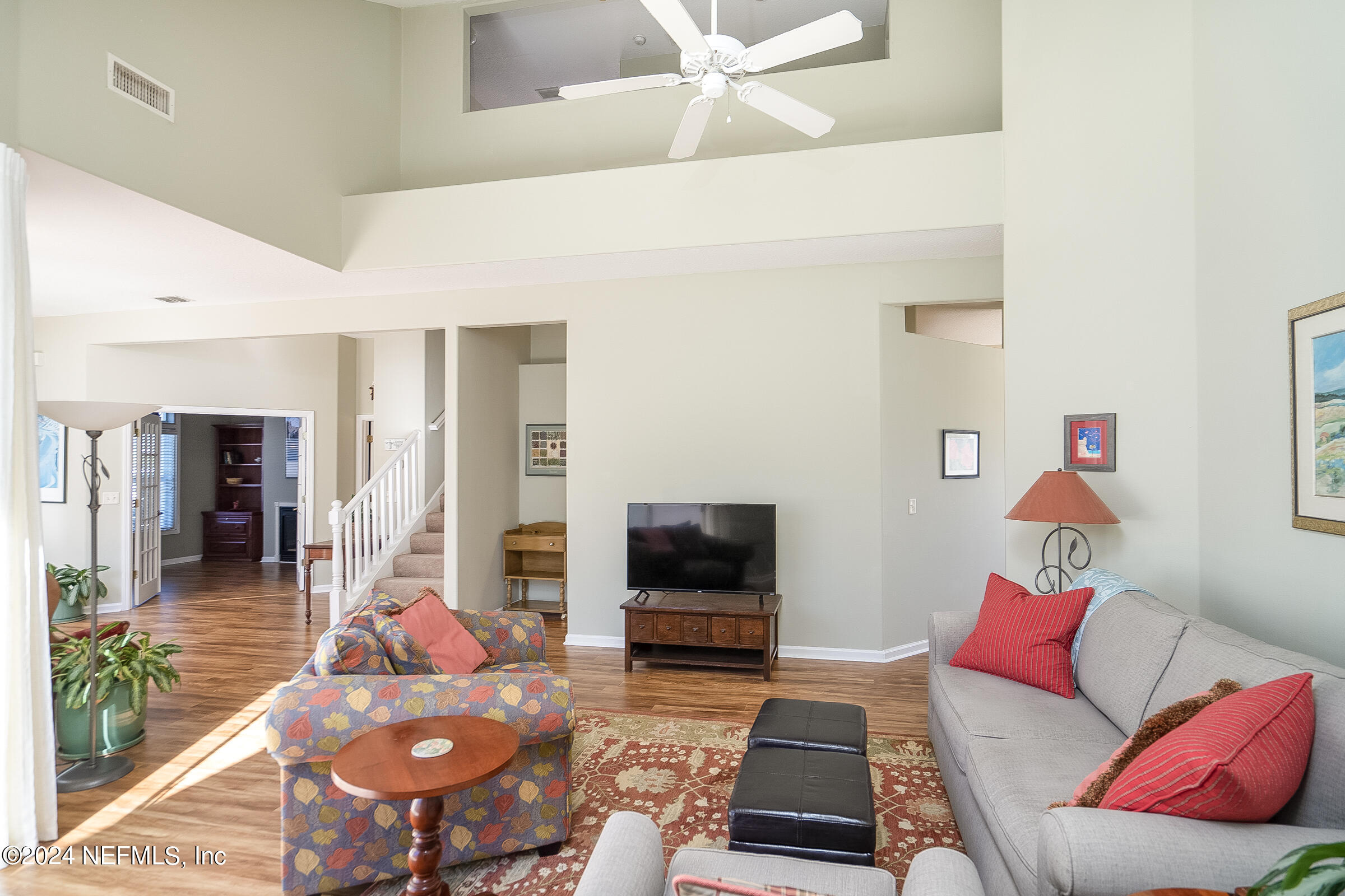 165 Cedar Ridge Circle St. Augustine, FL 32080 - Photo 3 of 45 a living room with furniture and a flat screen tv