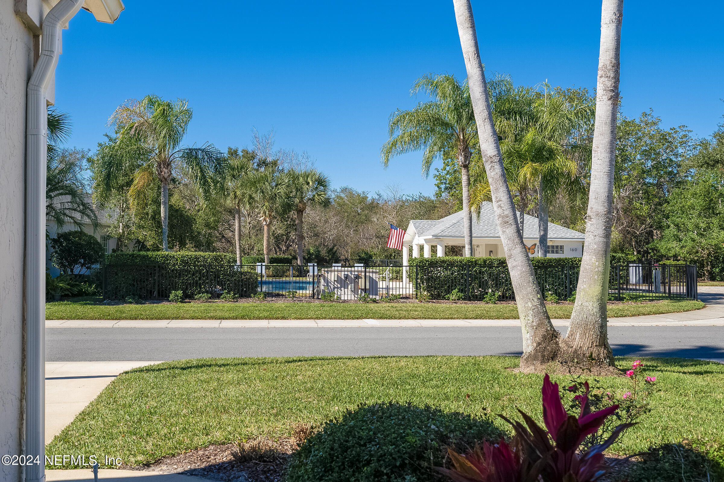 165 Cedar Ridge Circle St. Augustine, FL 32080 - Photo 43 of 45 a view of a yard with flower plants