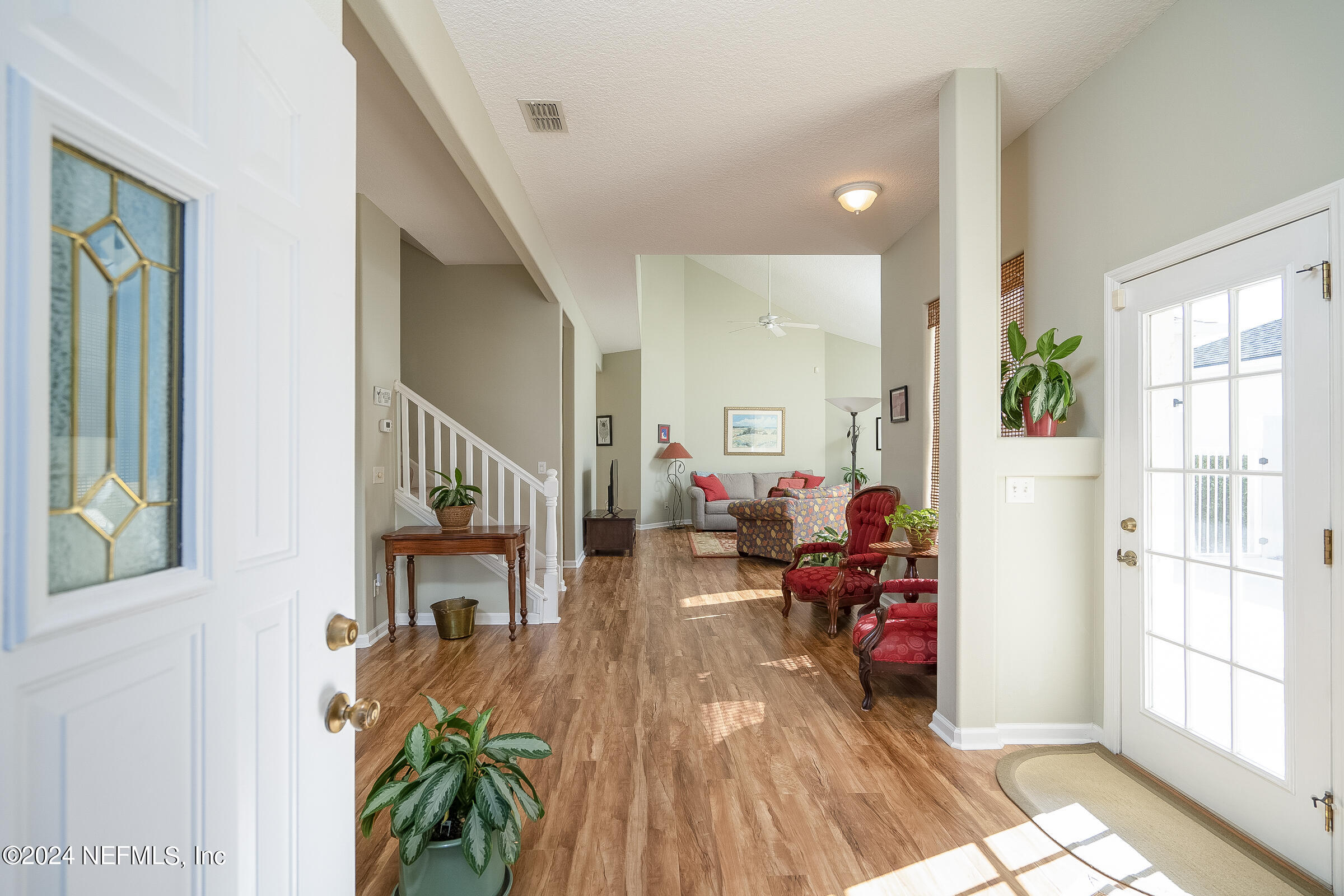 165 Cedar Ridge Circle St. Augustine, FL 32080 - Photo 8 of 45 a living room with furniture and a potted plant