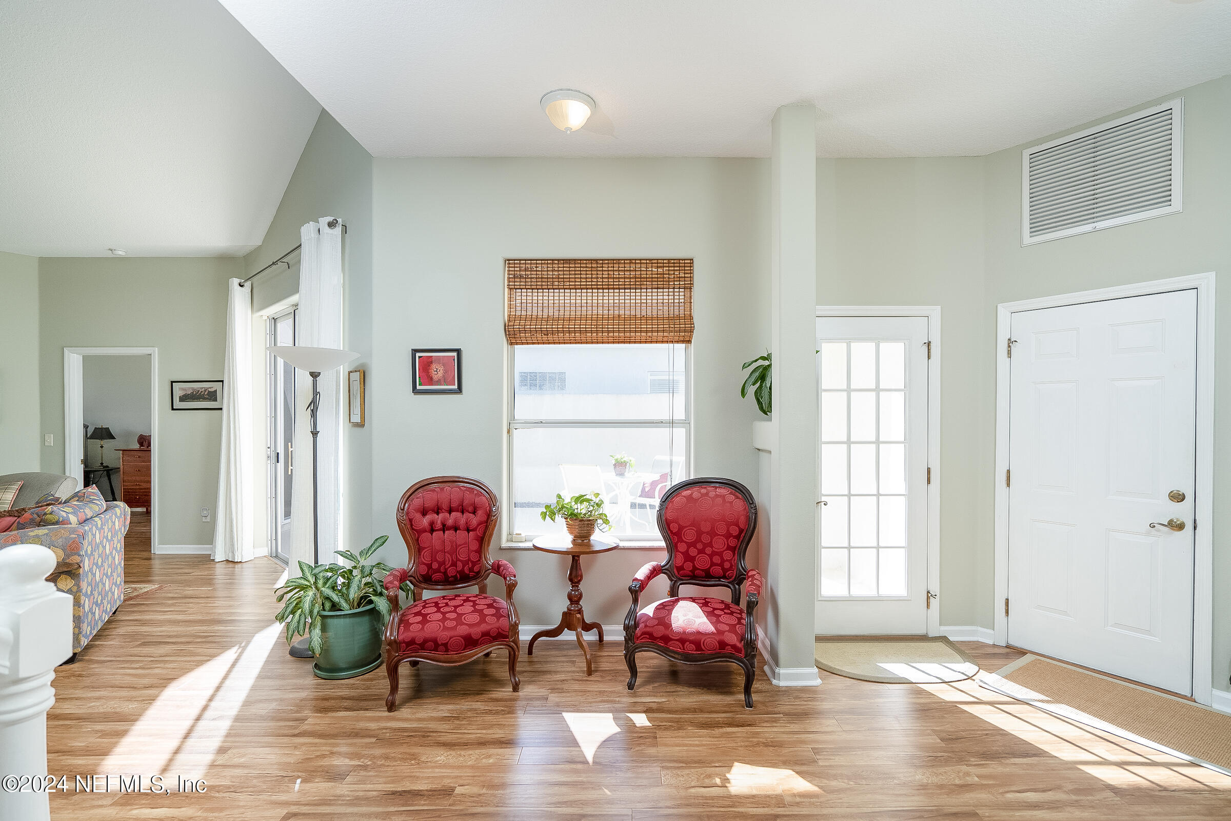 165 Cedar Ridge Circle St. Augustine, FL 32080 - Photo 10 of 45 a living room with furniture and a window