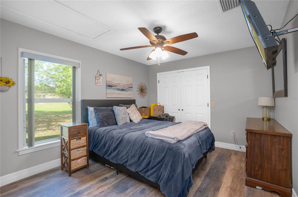 5466 West Tortuga Loop Lecanto, FL 34461 - Photo 24 of 41 a bedroom with a bed and a window