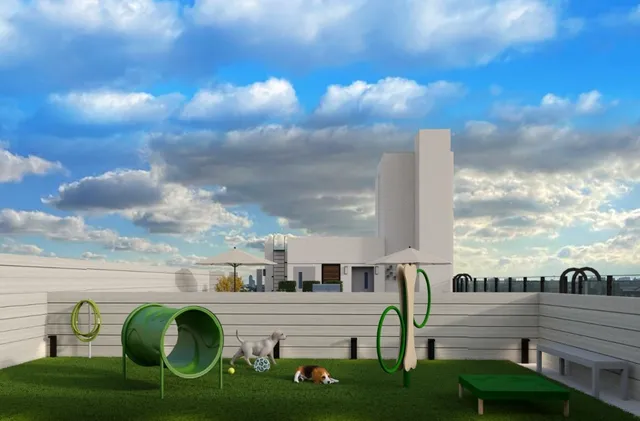 a bathroom with a tub shower and window