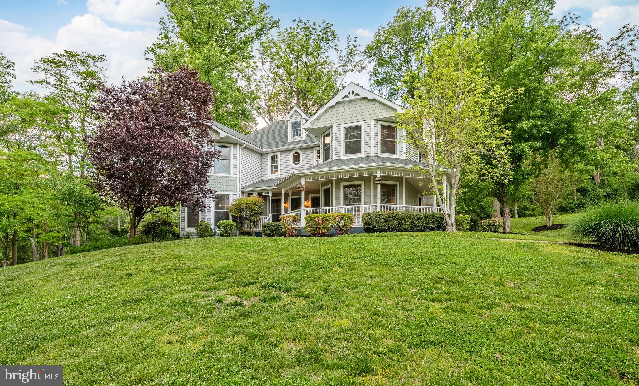 52 Atwater Road Chadds Ford, PA 19317 - Photo 1 of 85 a front view of a house with a yard