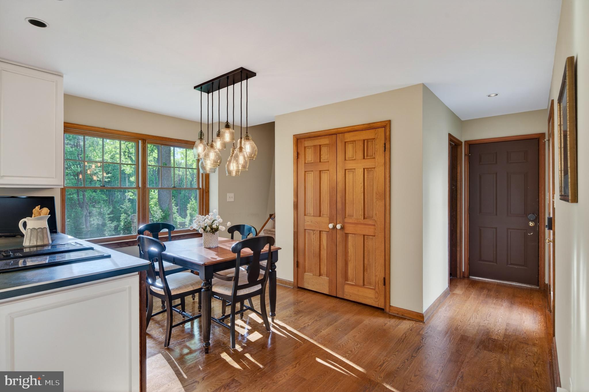 52 Atwater Road Chadds Ford, PA 19317 - Photo 19 of 85 a dining room with furniture a chandelier and wooden floor
