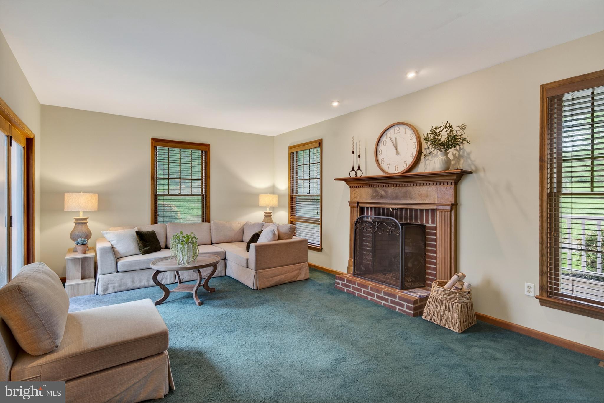 52 Atwater Road Chadds Ford, PA 19317 - Photo 24 of 85 a living room with furniture and a fireplace